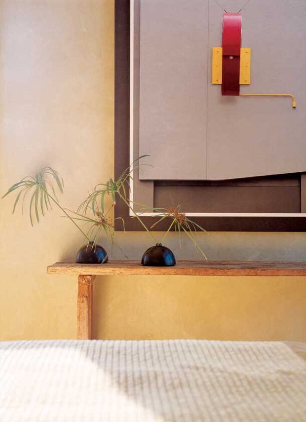 Sandra’s bedroom is a serene mix of modern art and Asian influences.